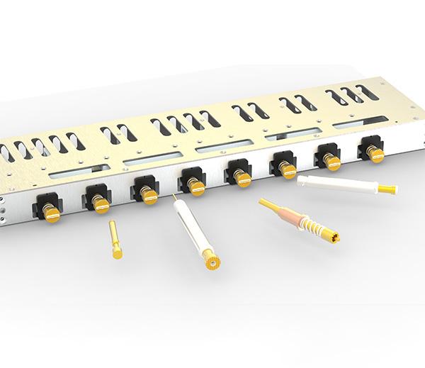 Custom high current probe solutions including various spring options, plating samples, and prototype fixtures in a collaborative engineering meeting